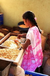 8559060-girl-shelling-cashew-nuts-in-a-cashew-nut-factory-in-goa-india17-january-2008 resize