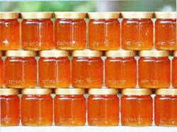 Romanii cu venituri mici primesc miere falsificata de la APIA